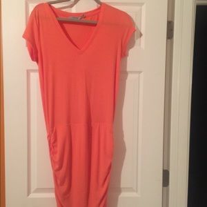 NWOT.  Athletes dress, coral, size XS.